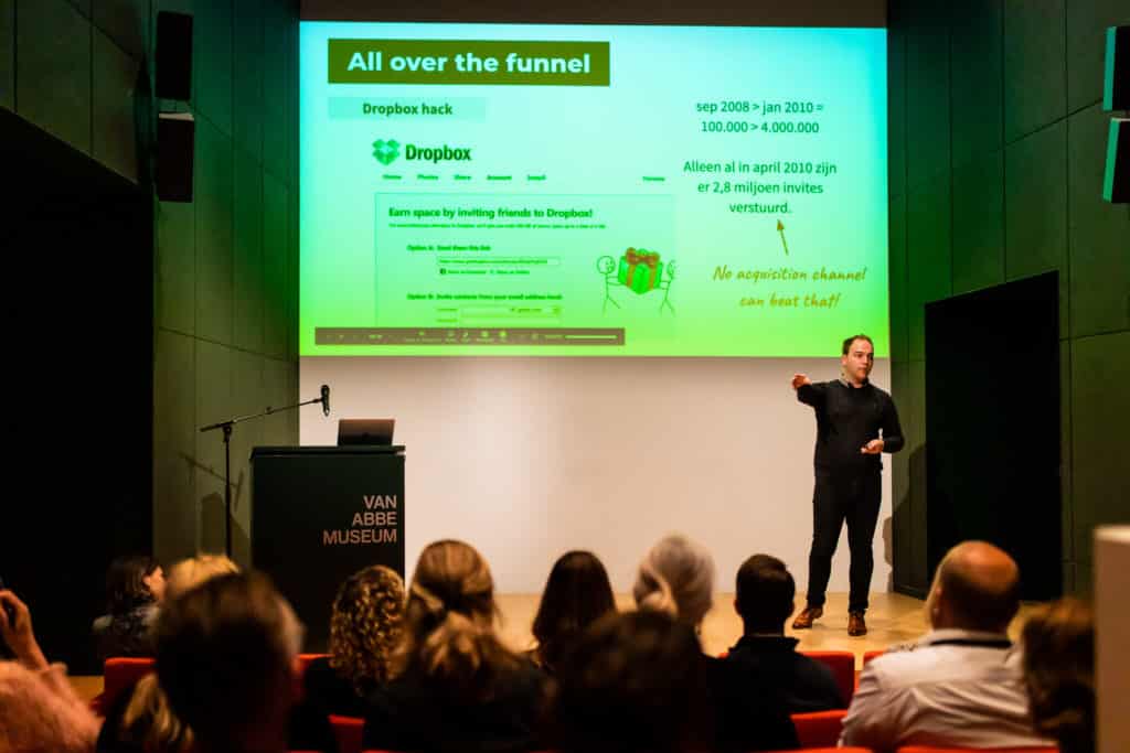 Ward van Gasteren speaking on stage